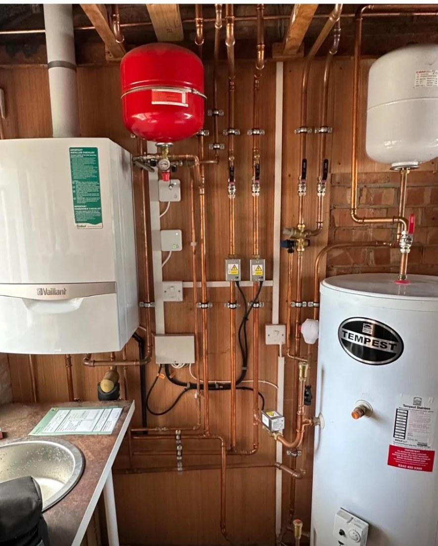 New Vaillant boiler and Tempest unvented cylinder installation with copper pipework in a Manchester home